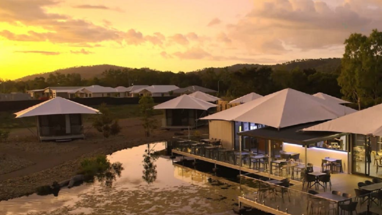 View of Townsville Eco Resort during sunset with cabins in the background